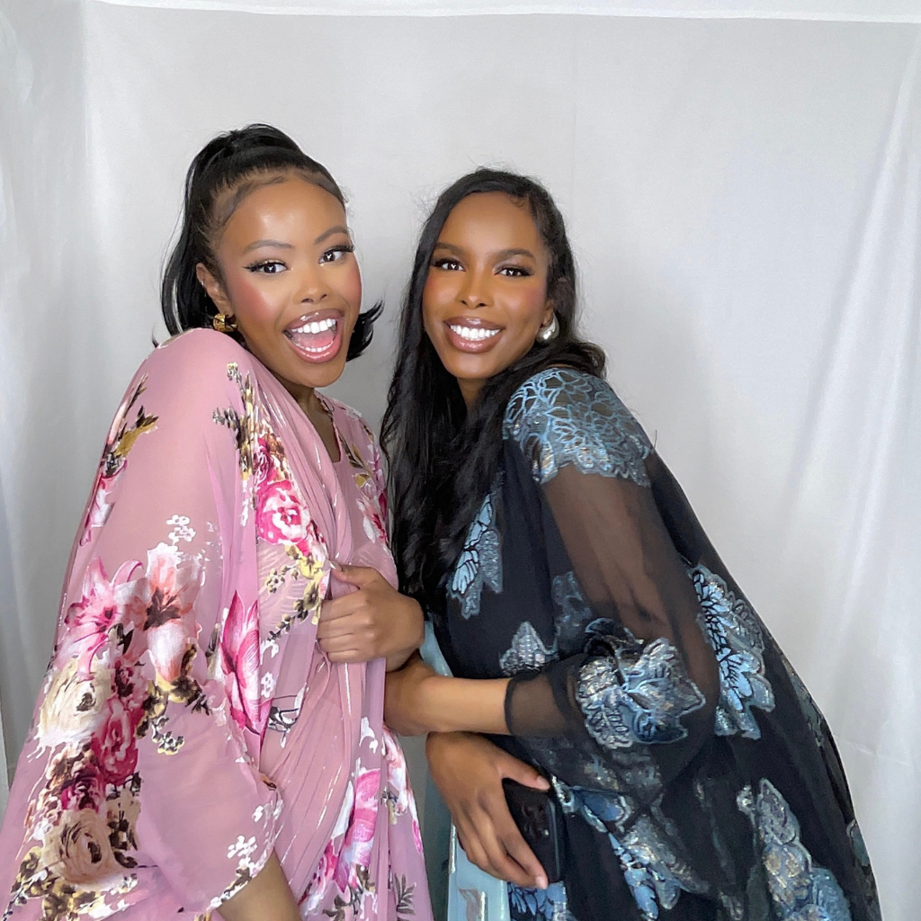 two women posing for a photo shoot at pohze photo booth in ottawa